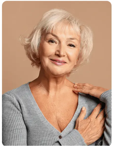 Mature woman smiling in the FlirtWithGranny profile preview