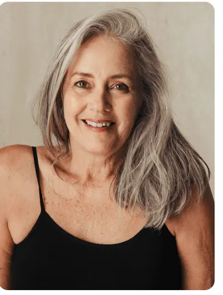 Grey-haired woman shown in the FlirtWithGranny mature dating preview